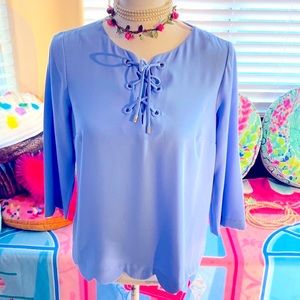 Talbots light blue almost periwinkle top with lace up tie front